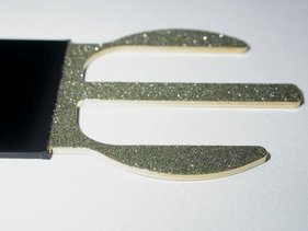 Greiffinger aus Edelstahl, beschichtet mit D107 synthet. Diamantkorn, anschließend vergoldet
